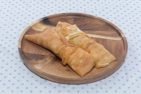 crepe roll with egg,Thai dessert on plateの写真素材