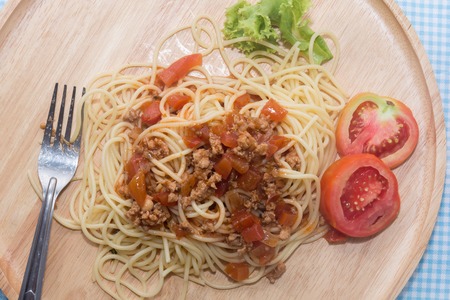 close up of spaghetti with sauce and forkの写真素材