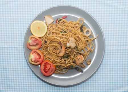 close up of spaghetti with seafood on plateの写真素材