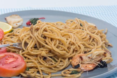 close up of spaghetti seafood with forkの写真素材