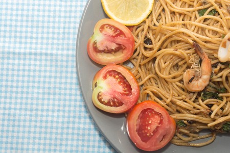 close up of spaghetti with seafood on plateの写真素材