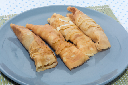 crepe roll with egg,Thai dessert on plateの写真素材