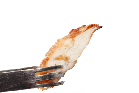 close up of holding roast chicken breastの写真素材