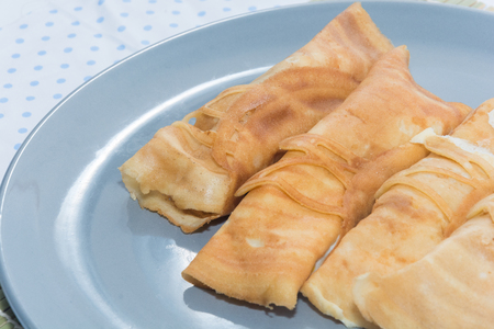 crepe roll with egg,Thai dessert on plateの写真素材