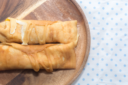 crepe roll with egg,Thai dessert on plateの写真素材