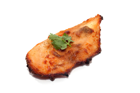 Roast chicken breast isolated on white backgroundの写真素材