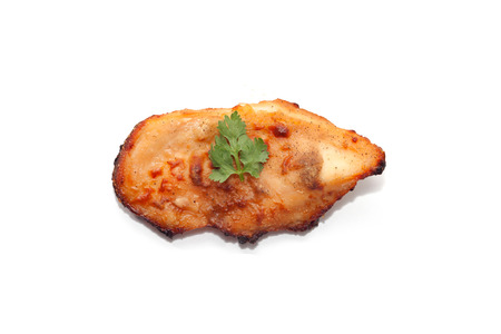 Roast chicken breast isolated on white backgroundの写真素材