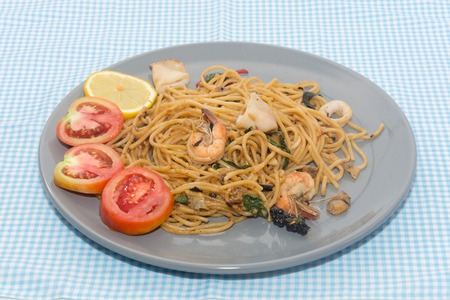 close up of spaghetti with seafood on plateの写真素材