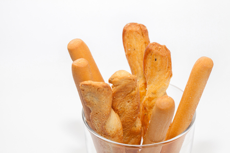 bread stick on cup isolated on white backgroundの写真素材