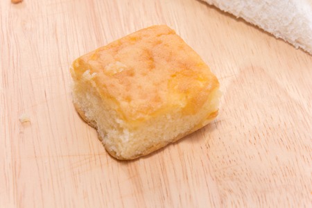 close up chiffon cake on wooden plate
