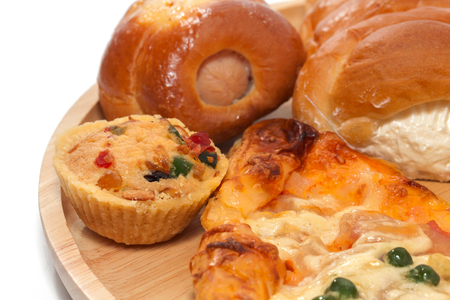 close up of variety of bakery on wooden plateの写真素材