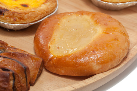 close up of variety of bakery on wooden plateの写真素材