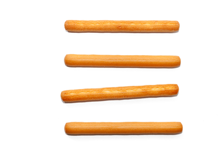 salted bread stick isolated on white backgroundの写真素材
