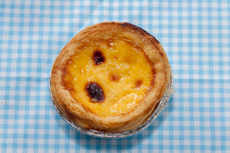close up of egg tarts on fabricの写真素材