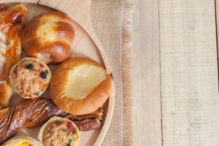 close up of variety of bakery on wooden plateの写真素材