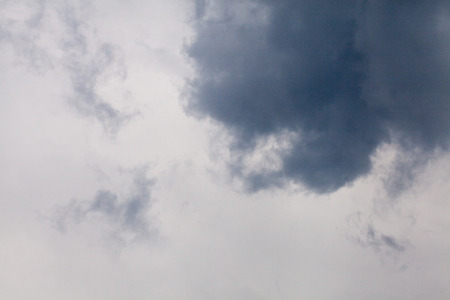 grey cloud before storm coming in thailandの写真素材