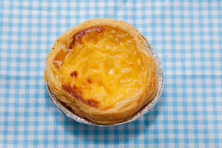 close up of egg tarts on fabricの写真素材