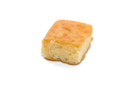 a piece of chiffon cake on white backgroundの写真素材