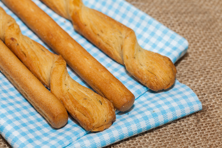 close up of salted bread stick on sackの写真素材