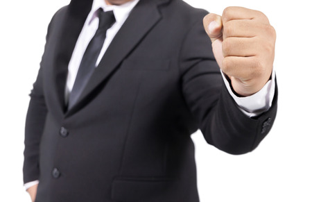 businessman in a suit hand fist isolated on white backgroundの写真素材