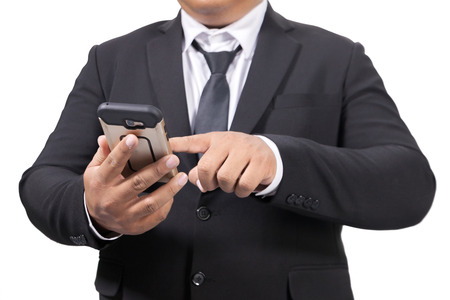 businessman in a suit use smart phoneの写真素材