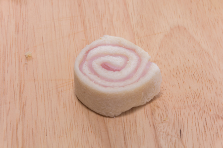 close up of bologna sandwich on wooden plateの写真素材