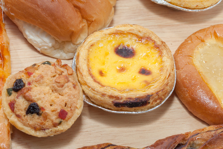 close up of variety of bakery on wooden plateの写真素材