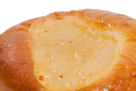 close up of bakery with jam on white background