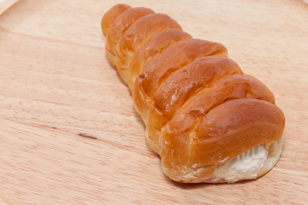 Puff Pastry Cannoli Cones on wooden plateの写真素材