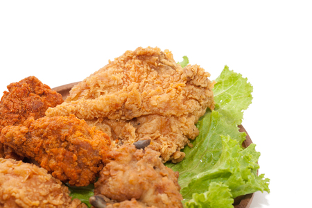 close up of fried chickens on wooden plateの写真素材