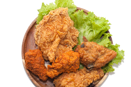 close up of fried chickens on wooden plateの写真素材