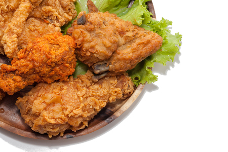 close up of fried chickens on wooden plateの写真素材