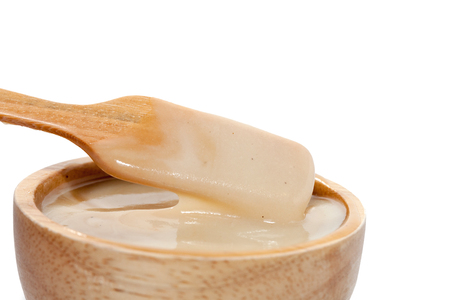 close up of mash potato on wooden bowlの写真素材