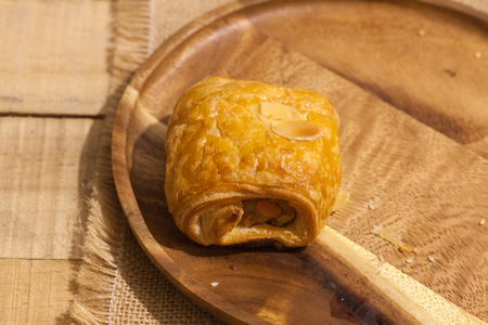 a variety of bakery on wooden plateの写真素材