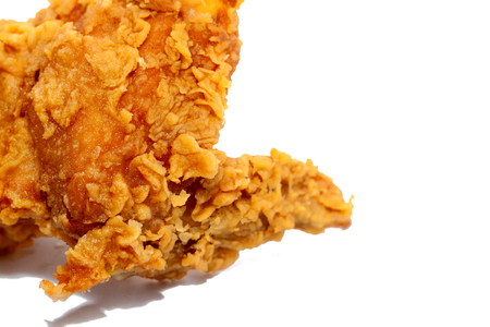 close up of fried chicken isolated on white backgroundの写真素材