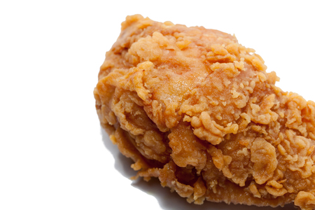 close up of fried chicken isolated on white backgroundの写真素材