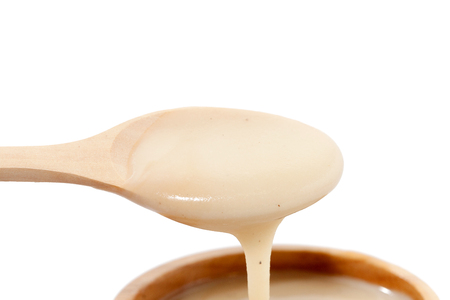 close up of mash potato on wooden bowlの写真素材
