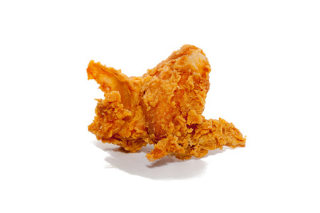 close up of fried chicken isolated on white backgroundの写真素材