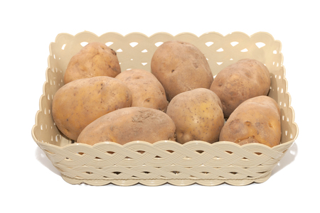 close up of pile of potato in the basketの写真素材