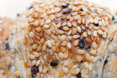 close up of sesame croissant on plateの写真素材