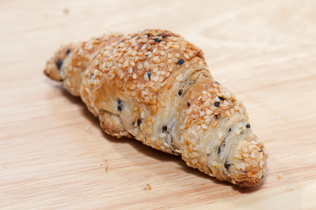 close up of sesame croissant on plateの写真素材