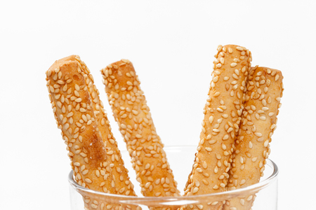Close up of bread stick on glassの写真素材