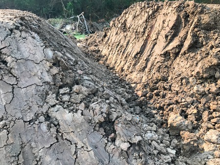 dirt pile in construction site at thailandの写真素材