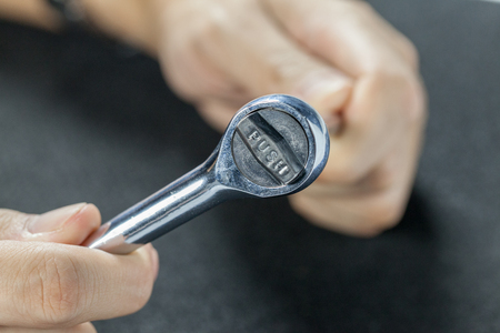close up of Hand with Ratchet spannerの写真素材