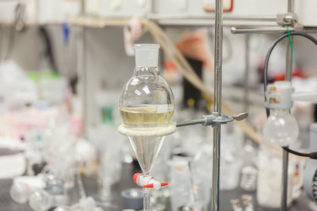 Round-bottom flask and Burette clamp in laboratoryの写真素材