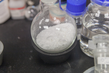 close up of Scientist working in laboratory mixing liquids