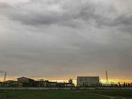 Factory and sunset at evening in thailandの写真素材
