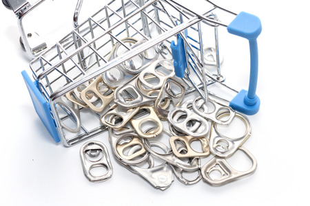 cap of can on mini supermarket cart