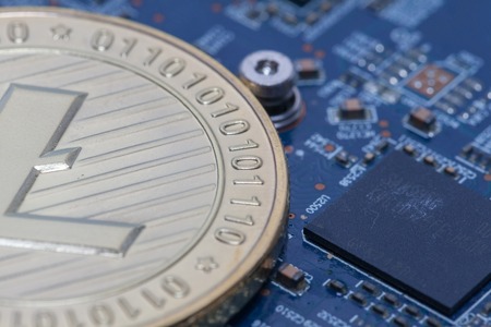 close up of bitcoin on Printed circuit boardの写真素材