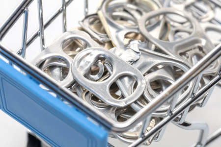 cap of can on mini supermarket cart